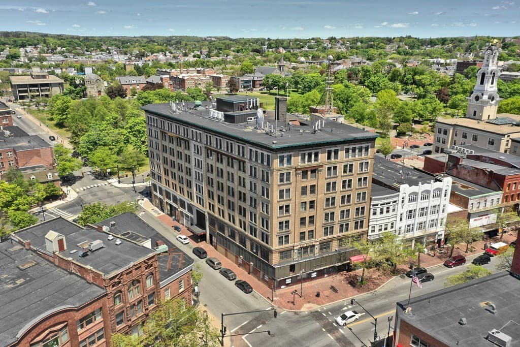 Second aerial view showing the building in downtown Lawrence Massachusetts urban context