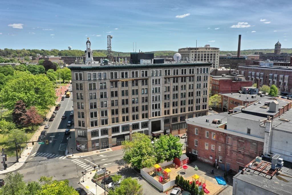 Aerial view of the brick mid-rise at 111 Lawrence Street in downtown Lawrence Massachusetts